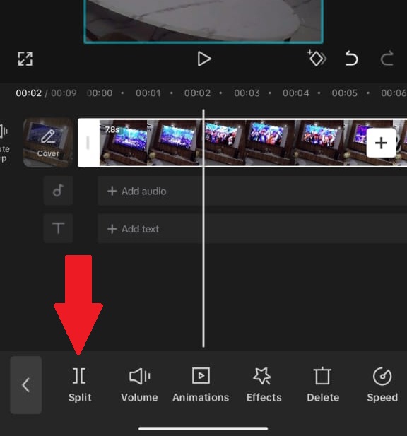 Screenshot of CapCut mobile app showing the Split tool active on the timeline, with a video clip divided into three segments for partial reverse effect